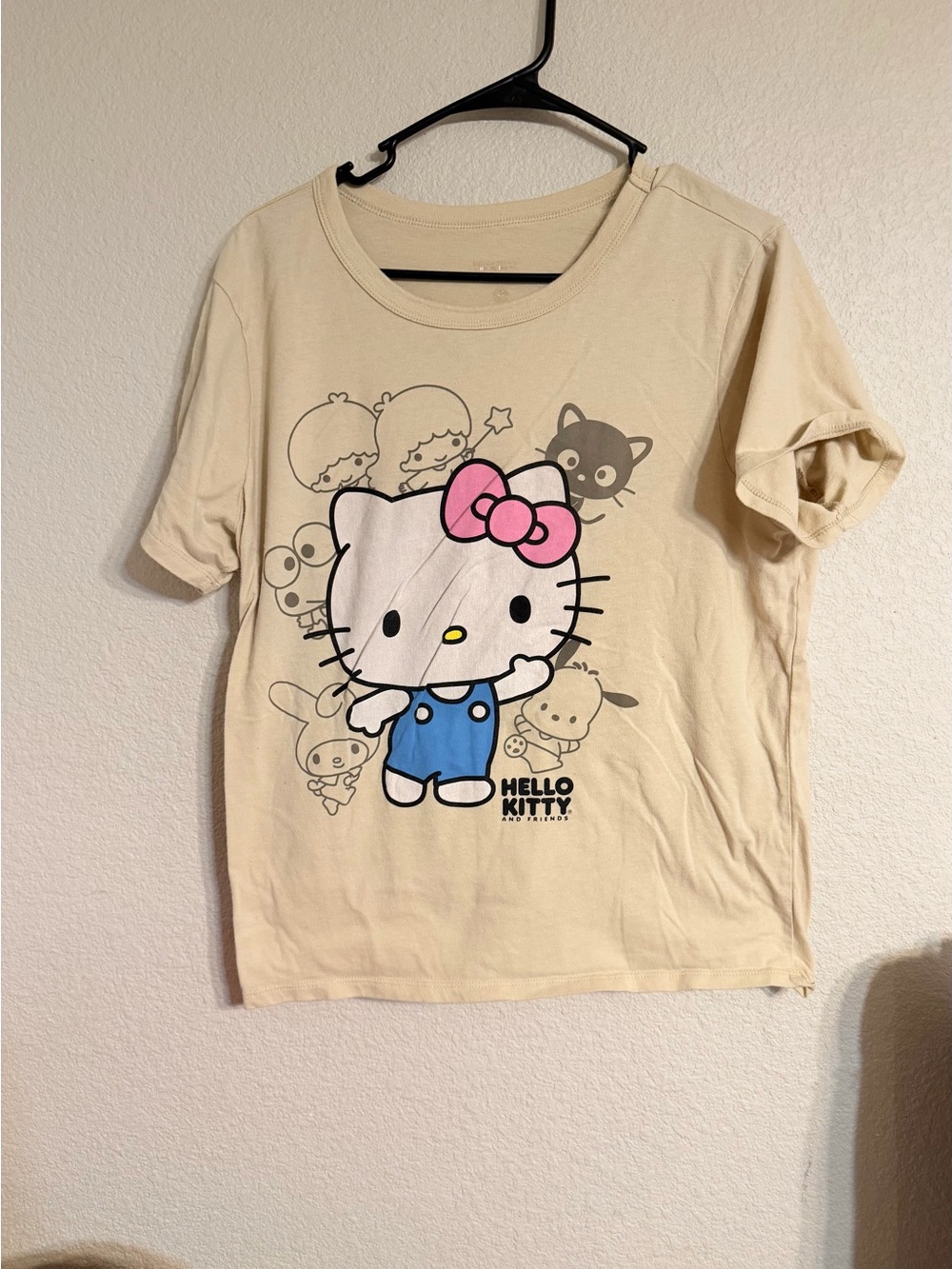 Hello Kitty Short Sleeve Tee in Cream with Pink Bow and Blue Overalls